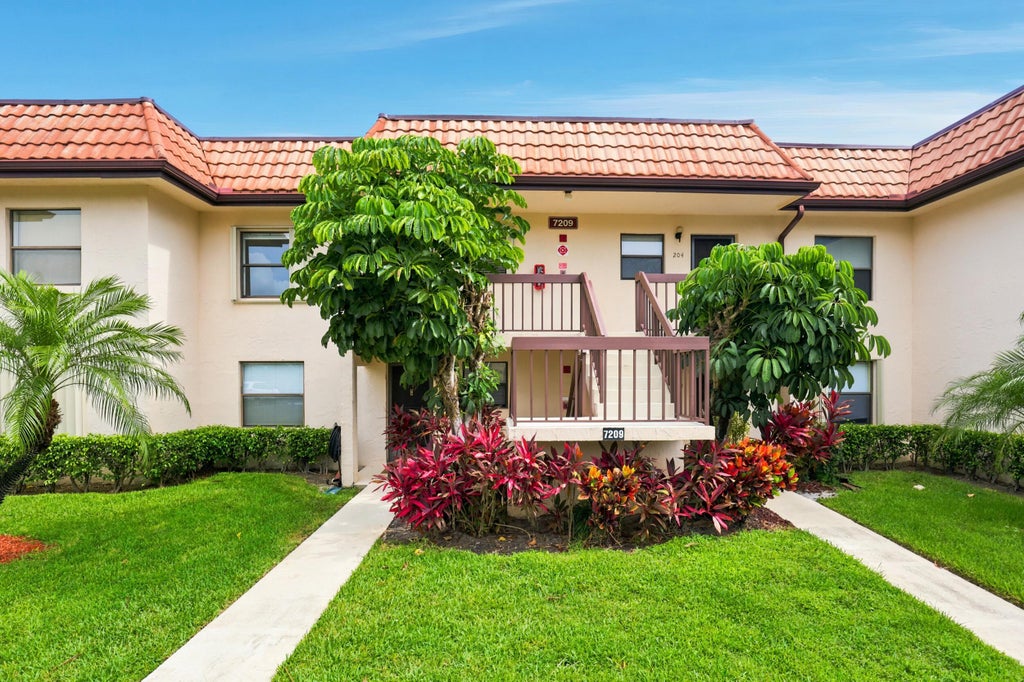 Photo of 7209 Golf Colony Court, Greenacres, FL 33467 (MLS # B26045069)