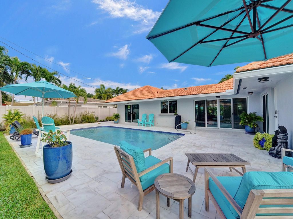 Photo of 2142 NE 56th Pl, Fort Lauderdale, FL 33308 (MLS # F10430045)