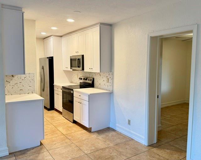 Beautifully renovated 2 bedroom, 1 bath condo featuring quartz countertops, stainless steel appliances, and sleek white cabinetry. This light and bright home is located in a lovely community with lush landscaping, an inviting pool, and convenient onsite laundry facilities. Move-in ready and perfectly situated!