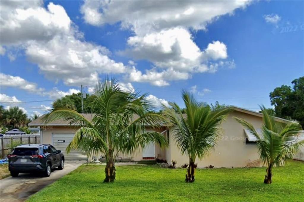 Photo of 539 Cypress Dr, Lake Park, FL 33403 (MLS # F10364029)