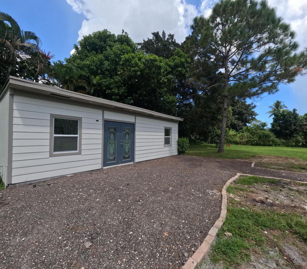 Photo of 12809 N 53rd Rd Road N, The Acreage, FL 33411 (MLS # B26005719)