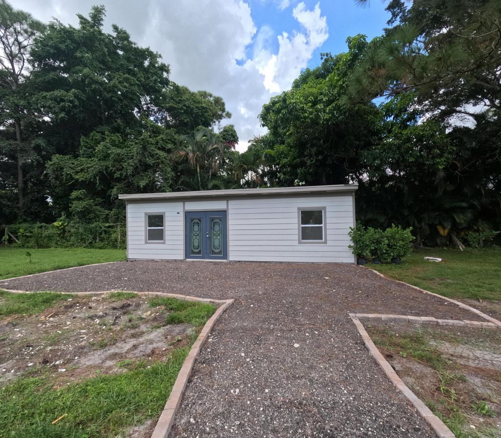 Photo of 12809 N 53rd Rd Road N, The Acreage, FL 33411 (MLS # B26005719)