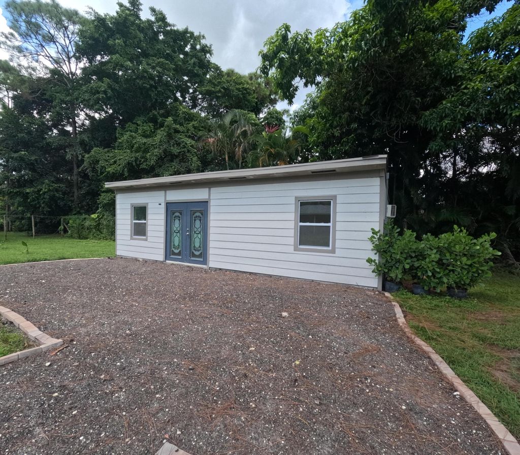 Photo of 12809 N 53rd Rd Road N, The Acreage, FL 33411 (MLS # B26005719)