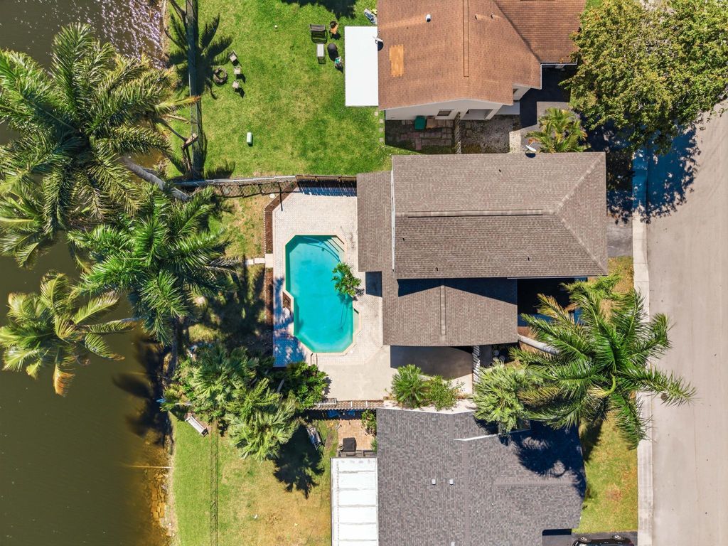 Photo of 820 Rock Hill Avenue, Davie, FL 33325 (MLS # B26030667)