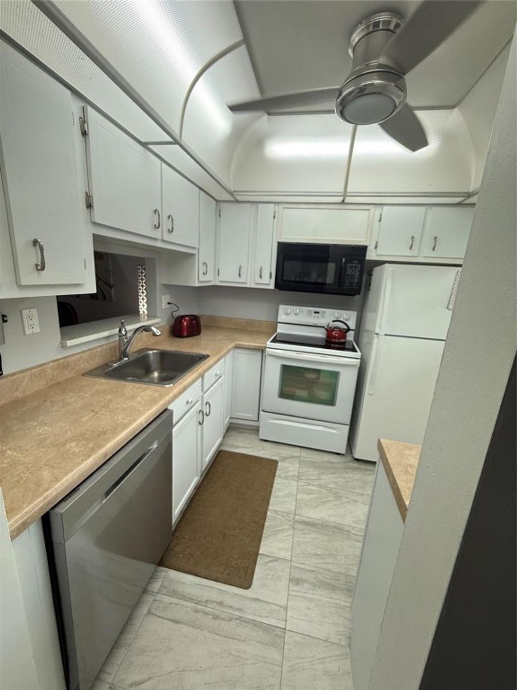 Photo of 3431 NW 50th Avenue #304, Lauderdale Lakes, FL 33319 (MLS # F10545064)