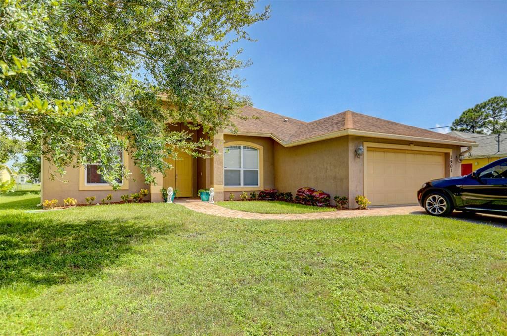 Photo of 1901 SW Lennox Street, Port Saint Lucie, FL 34953 (MLS # R10733596)