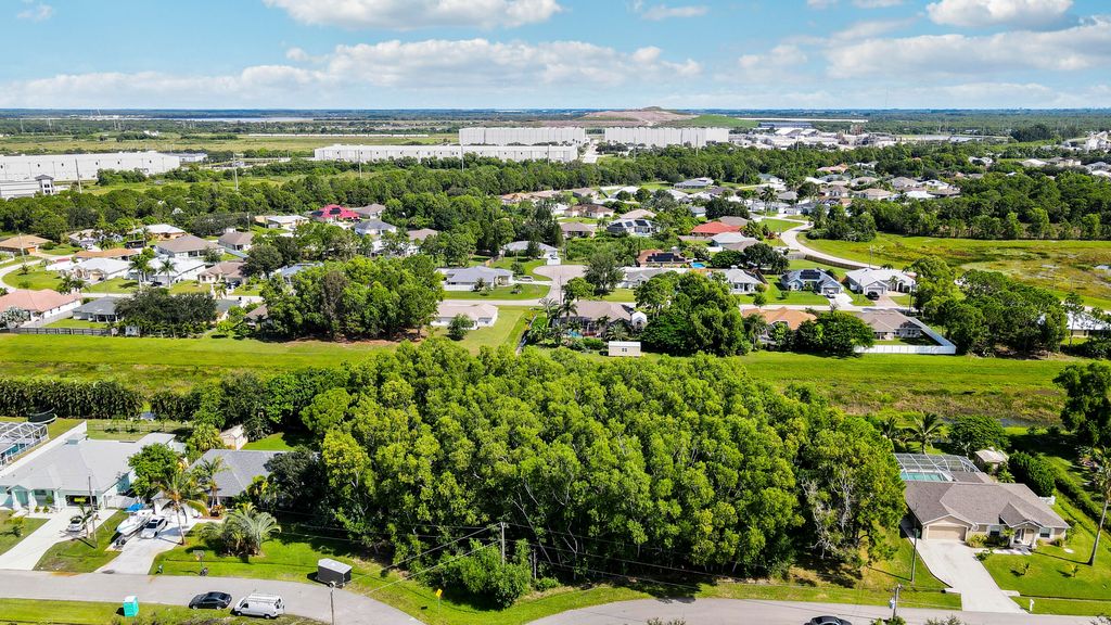 Photo of 5488 NW Boydga Avenue, Port Saint Lucie, FL 34986 (MLS # R11121874)
