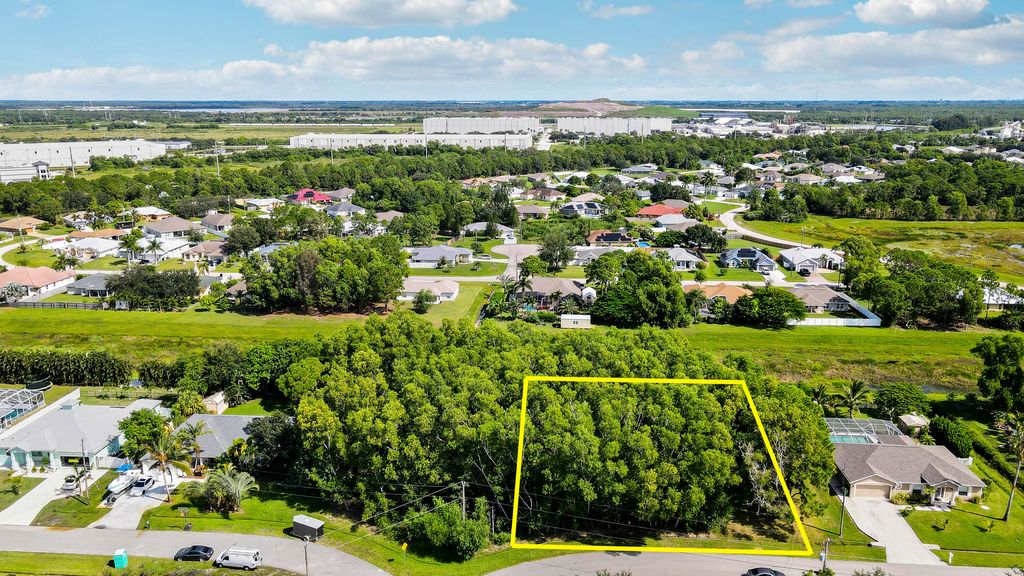 Photo of 5488 NW Boydga Avenue, Port Saint Lucie, FL 34986 (MLS # R11121874)