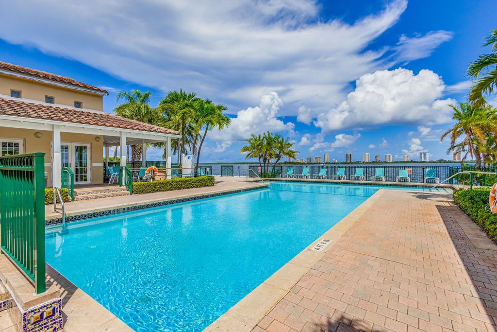 Photo of 1120 Lake Shore Drive #206, Lake Park, FL 33403 (MLS # R11108274)