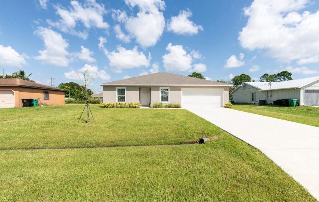 Photo of 479 SW Sw Holden Ter, Port Saint Lucie, FL 34984 (MLS # R11169189)