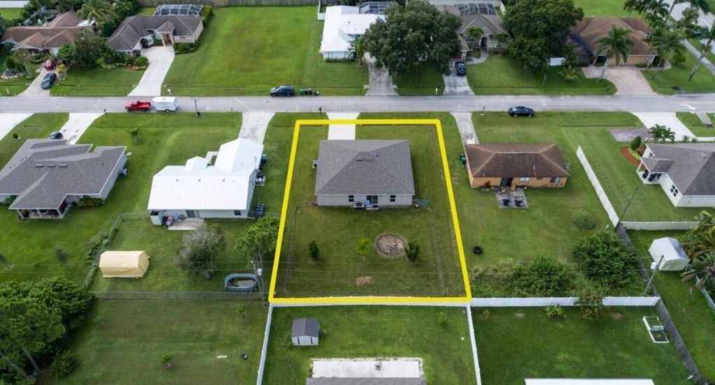 Photo of 479 SW Sw Holden Ter, Port Saint Lucie, FL 34984 (MLS # R11169189)