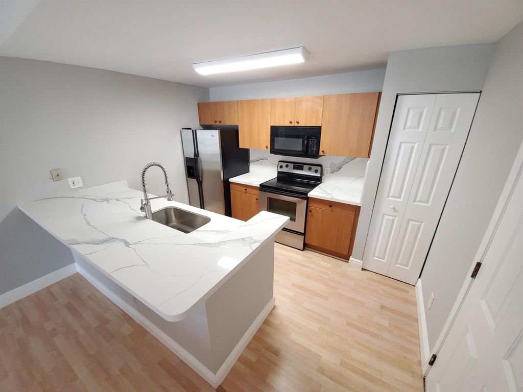 Photo of 1740 Palm Cove Boulevard #4-303, Delray Beach, FL 33445 (MLS # R10998542)