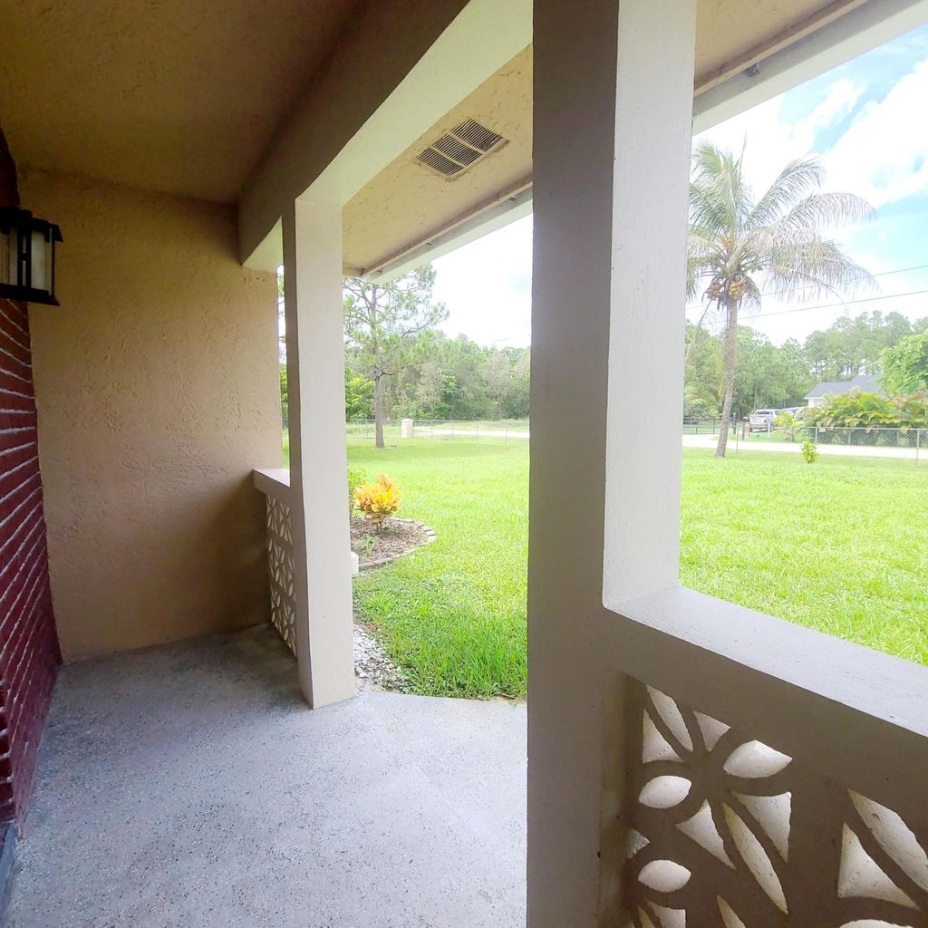 Photo of 16724 75th Place N, The Acreage, FL 33470 (MLS # R11015471)