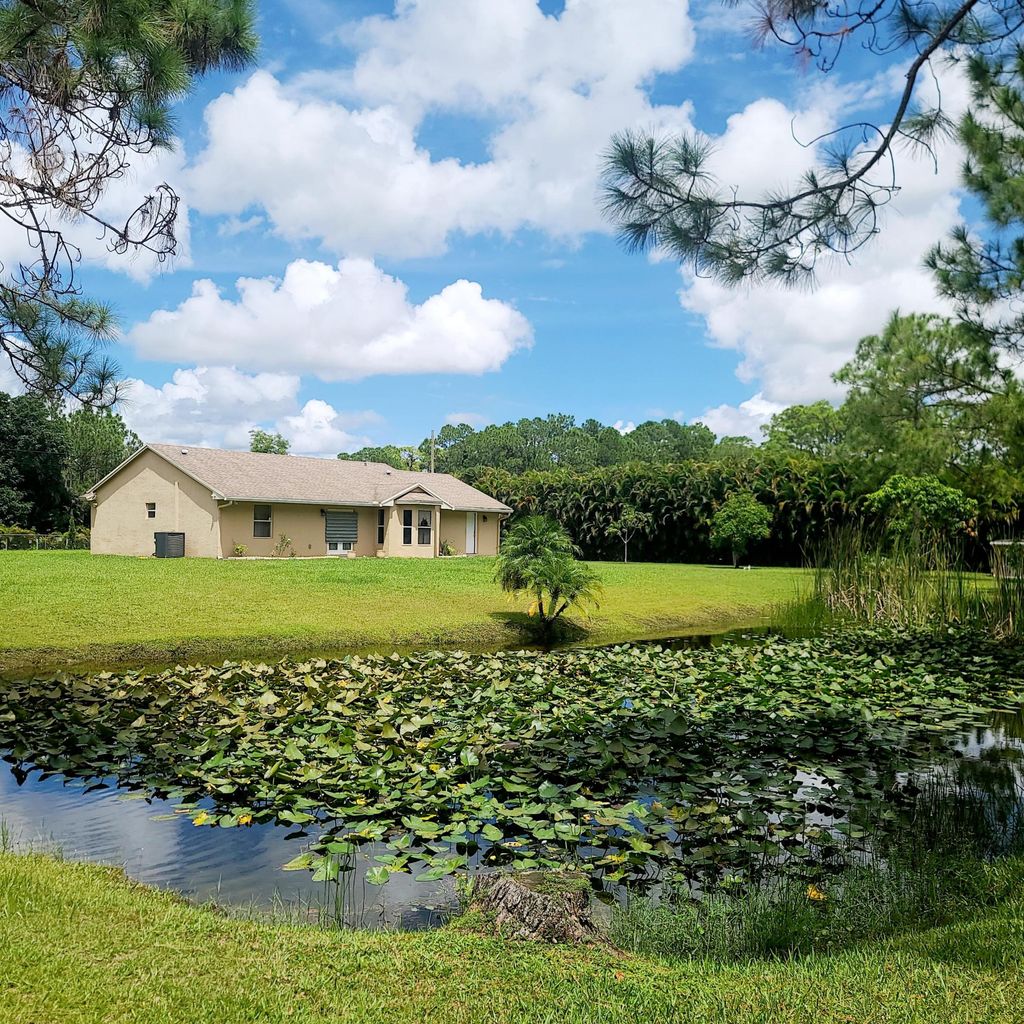 Photo of 16724 75th Place N, The Acreage, FL 33470 (MLS # R11015471)