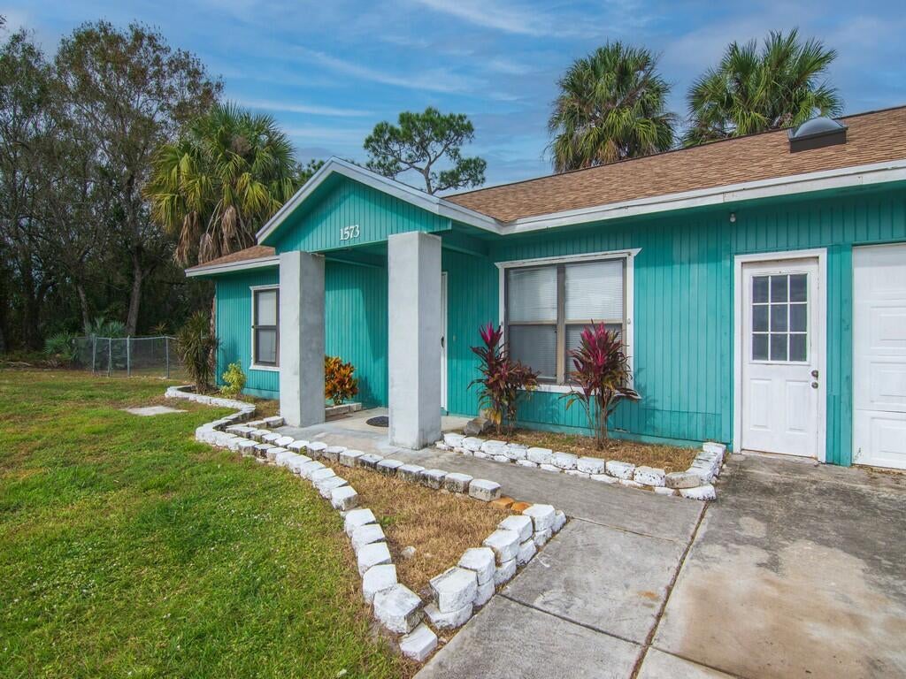 Photo of 1573 SW Del Rio Boulevard, Port Saint Lucie, FL 34953 (MLS # R10945231)