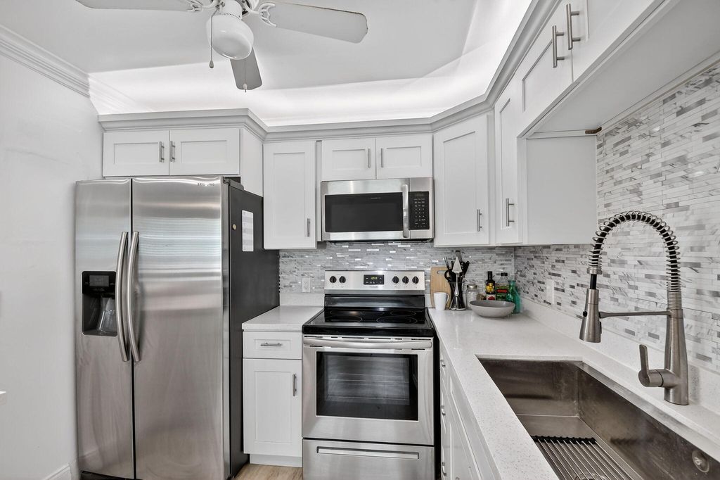 Photo of 582 Monaco Way #M, Delray Beach, FL 33446 (MLS # B26010775)