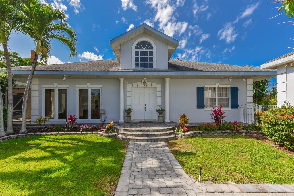 Photo of 11900 SE Plutus Avenue, Hobe Sound, FL 33455 (MLS # R11080550)