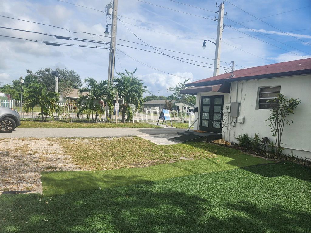 Photo of 1000 Foster Road, Hallandale Beach, FL 33009 (MLS # B26038527)