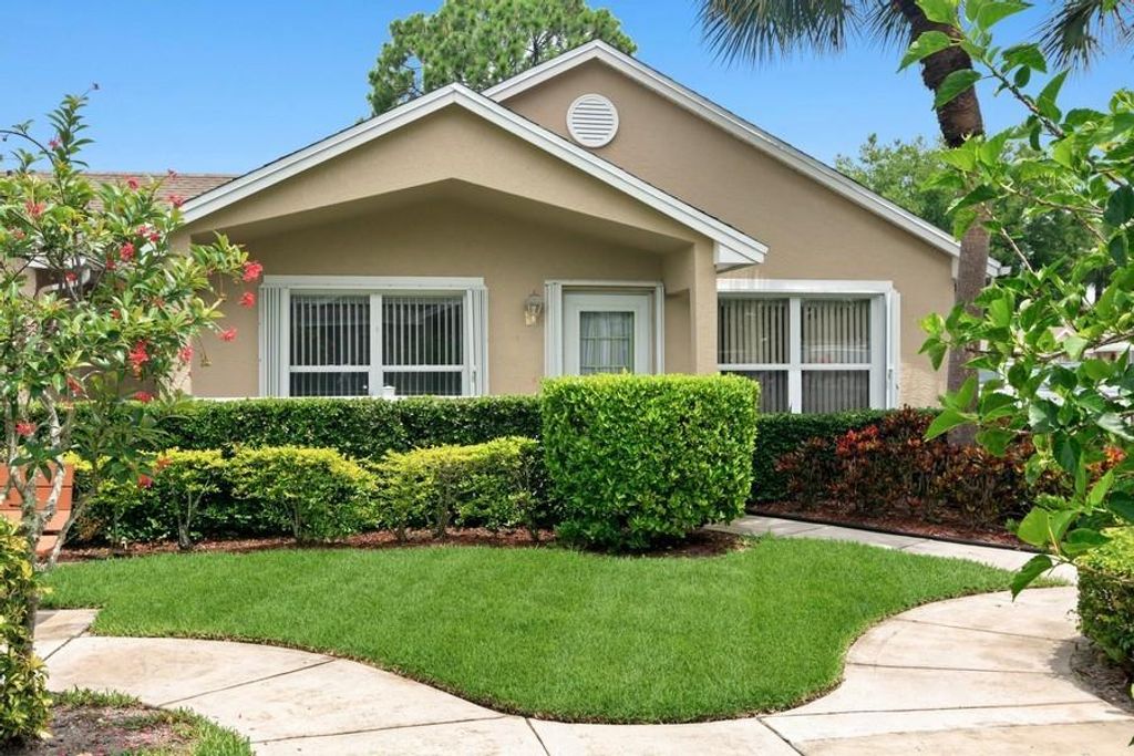 Photo of 607 NW San Remo Circle Cir, Saint Lucie West, FL 34986 (MLS # R10719542)