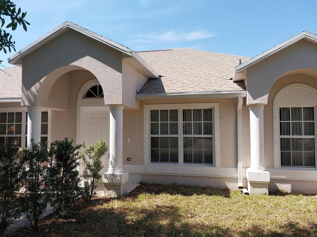 Photo of 245 SW Starfish Avenue, Port Saint Lucie, FL 34984 (MLS # B26006192)