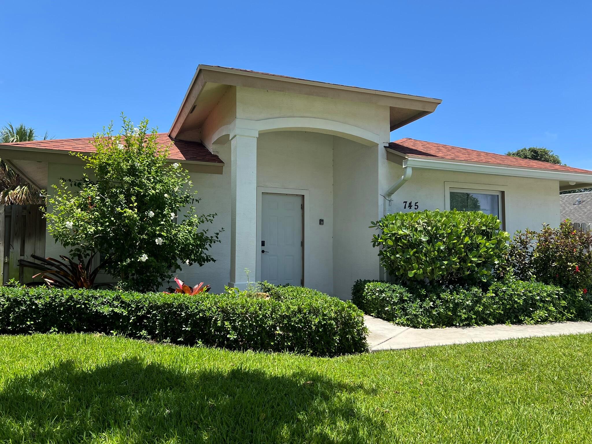 Built in 2018 this beautiful resort style living & modern elegant 3 bedroom, 2 bathroom home offers the perfect blend of design, comfort, lifestyle & location. The open floor plan is enhanced by wood-look tile flooring, stylish kitchen with sleek finishes, spacious bedrooms & spa like bathrooms. Impact windows throughout for peace of mind. Step outside to your private backyard retreat, featuring a heated saltwater pool, lush landscaping & turf grass perfect for relaxing, entertaining or hosting guests. This outdoor space is a true oasis. Located minutes from downtown West Palm Beach, fine dining, shopping & beautiful beaches. Fantastic opportunity for this to be your perfect home, 2nd home or as a lucrative investment. Currently used as a very successful Airbnb. NO HOA!