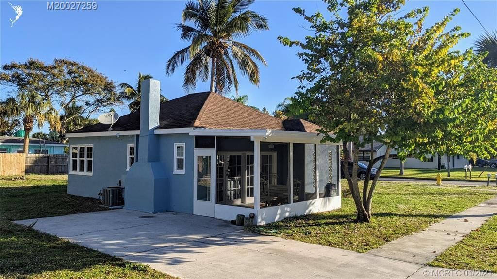 Photo of 1110 NE Martin Avenue, Jensen Beach, FL 34957 (MLS # R10682904)