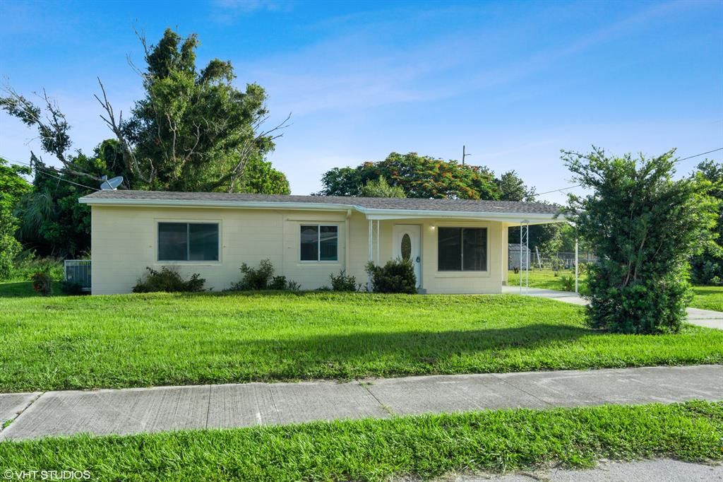 Photo of 2104 Ave P, Fort Pierce, FL 34950 (MLS # R10730881)