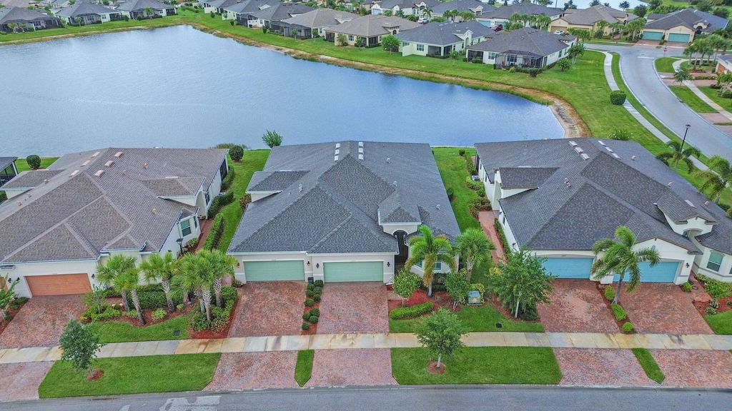 Photo of 11033 SW Sunrise Lake Drive, Port Saint Lucie, FL 34987 (MLS # R10996028)