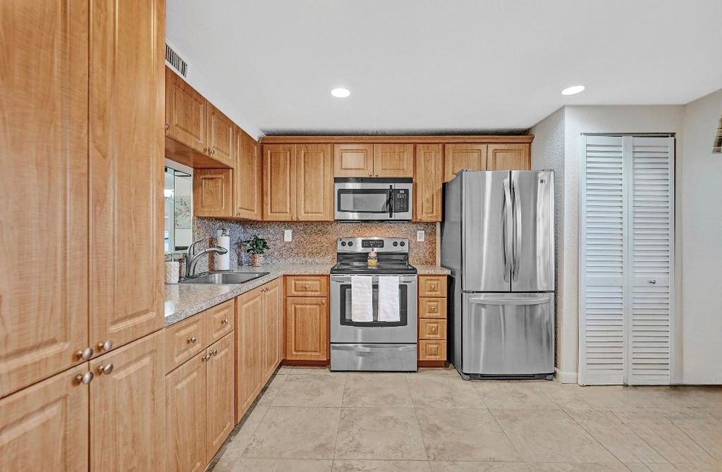 Photo of 900 Colony Point Cir #221, Pembroke Pines, FL 33026 (MLS # F10532673)