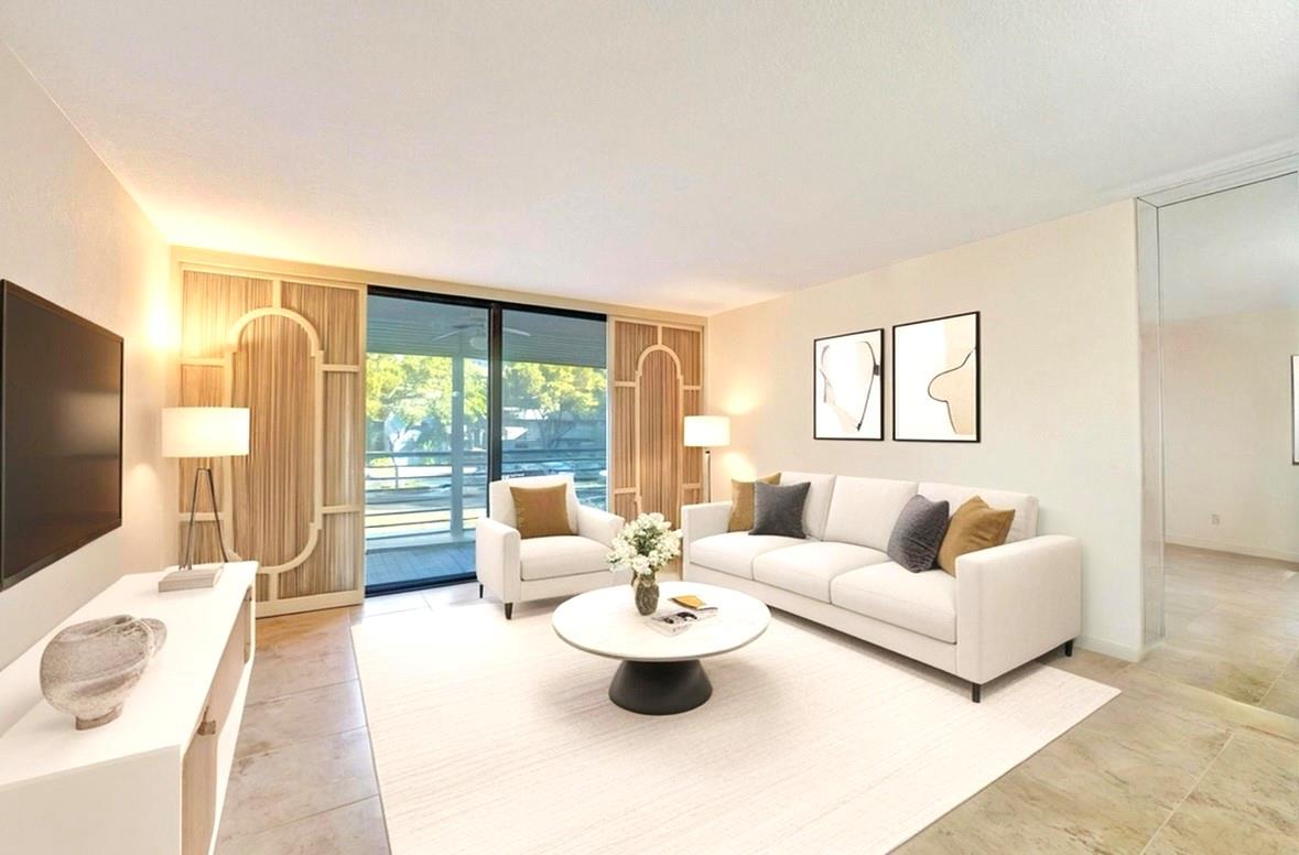 Cozy new condo in Pembroke Lakes nestled in the desirable 55+ gated community of Colony Point, this beautifully updated condo features over $50K in upgrades. Step inside to find NEW IMPACT DOORS & WINDOWS, spa-inspired bathrooms, and tile flooring throughout creating a seamless flow. Kitchen offers an abundance of cabinetry, sleek countertops, stainless steel appliances, and eat-in area. The primary bedroom is filled with natural light from its expansive windows, freshly painted interior with knockdown textured walls and ceilings add a modern touch. Covered screened patio is perfect for peaceful evenings or colorful sunsets. Washer/dryer in the unit.  Well-maintained with mature trees & beautiful lakes. Pool, gym, cable,  and more—all included in the maintenance. Come see before its gone!