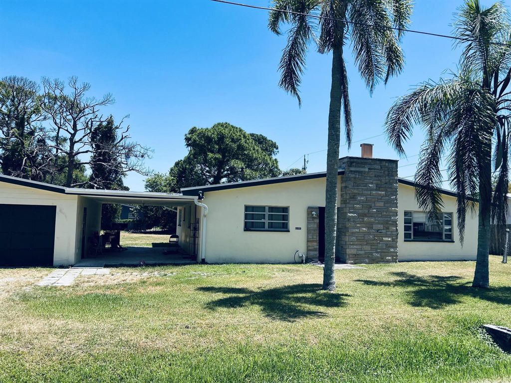 Photo of 3510 West Lake Drive, Fort Pierce, FL 34982 (MLS # R11092144)