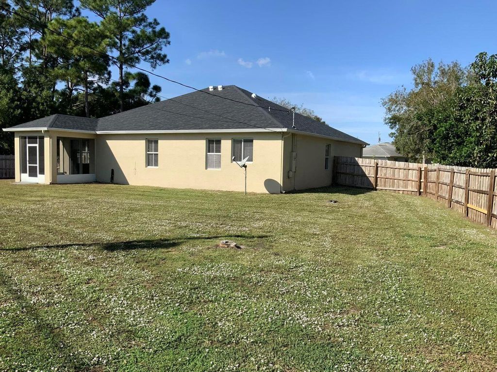 Photo of 1572 SW Gager Road, Port Saint Lucie, FL 34953 (MLS # R11077269)