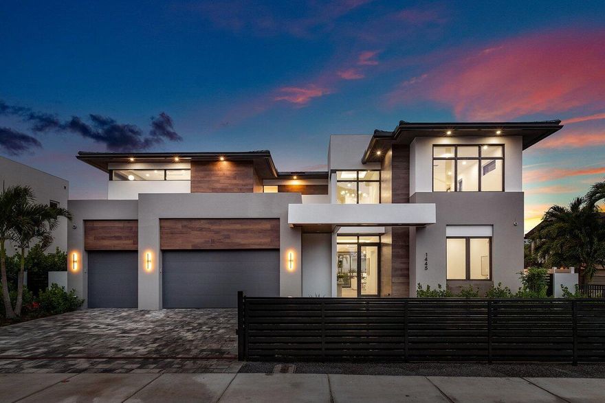 Core 4 Homes proudly unveils their newly completed Tropical Modern Estate, a masterpiece of design and craftsmanship. Spanning 4,913 square feet of air-conditioned living space, this exquisite residence features 5 bedrooms, 5.5 baths, and represents the most competitively priced new construction home per square foot in this sought-after neighborhood.Every detail of this home has been thoughtfully curated, showcasing premium features such as elegant white oak trim, a spacious butler's pantry, a three-car garage, and natural gas. The residence is outfitted with a designer appliance package, advanced home automation, a saltwater pool, an elevator, and custom wood veneer cabinetry. Additional highlights include a privacy car gate, a summer kitchen, and much more.