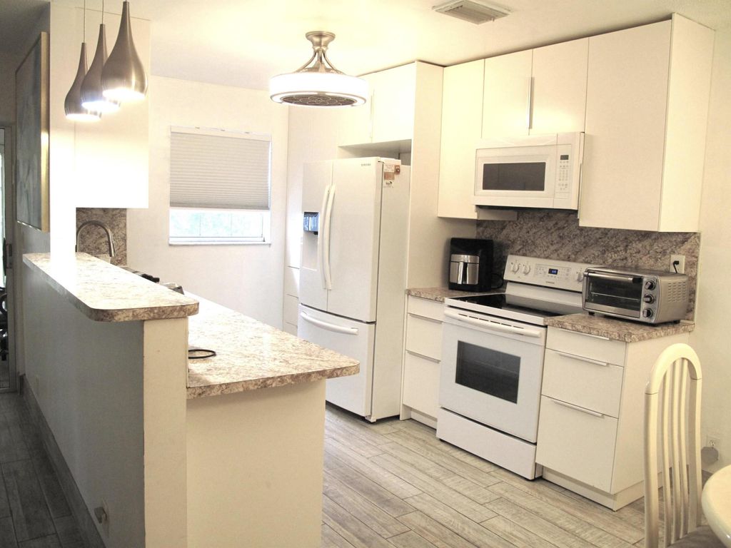 Photo of 325 NW 50th Avenue #C, Delray Beach, FL 33445 (MLS # B26004454)