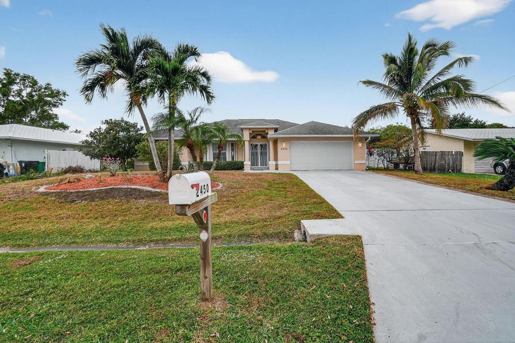 Photo of 2450 SE Perugia Street, Port Saint Lucie, FL 34952 (MLS # R11154709)