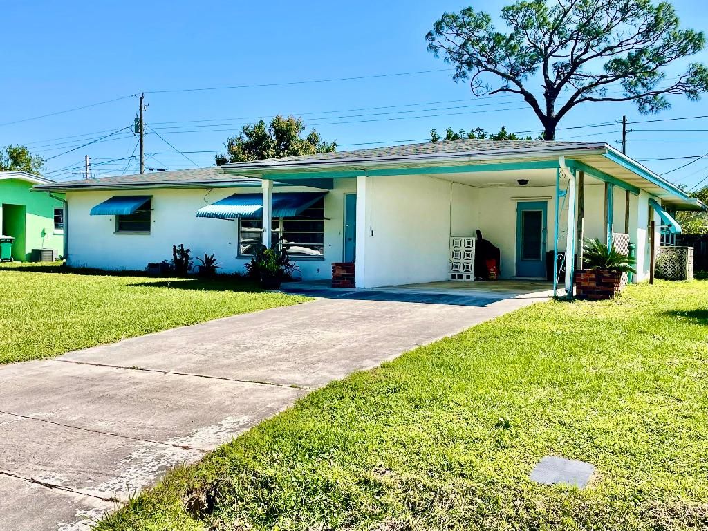 Photo of 325 Shady Lane, Port Saint Lucie, FL 34952 (MLS # R10962224)