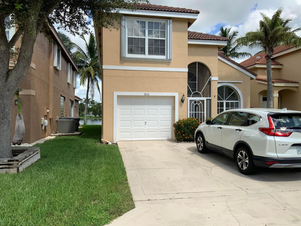 Photo of 7835 Springfield Lake Drive, Lake Worth, FL 33467 (MLS # R11128551)