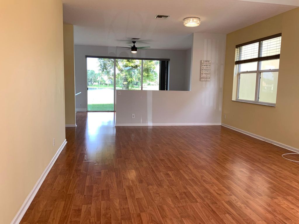 Photo of 7835 Springfield Lake Drive, Lake Worth, FL 33467 (MLS # R11128551)