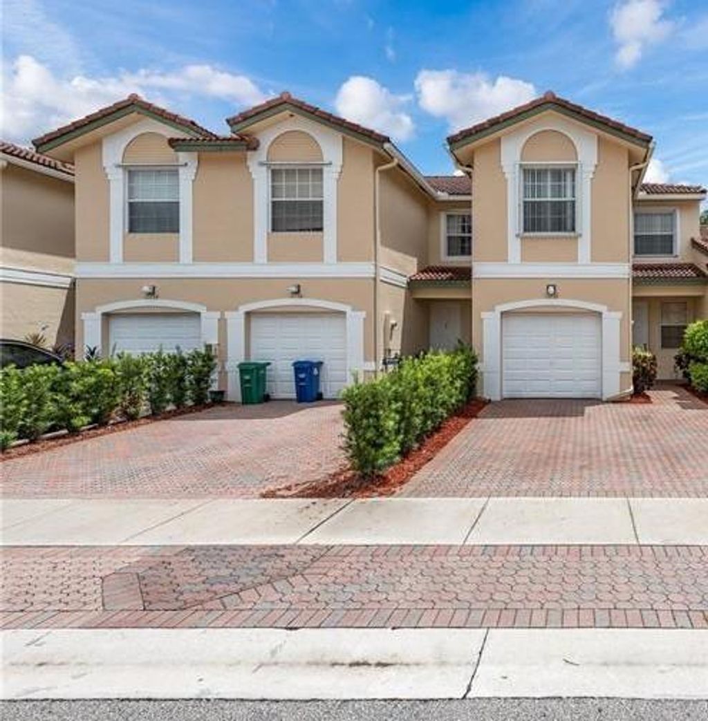 Photo of 11634 NW 47th Dr #11634, Coral Springs, FL 33076 (MLS # F10277490)