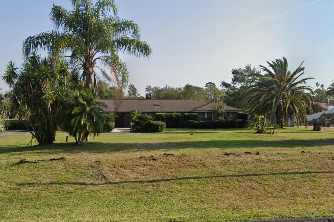 Your Private Paradise Awaits in Titusville! 1+ Acre HUGE Pool City Water!Well-loved and well-maintained home with accordion hurricane shutters, 2017 roof & A/C. Expansive layout, HUGE pool & pool deck, HUGE raised patio & pass-through bar-an entertainer's dream on 1 acre in Titusville! Fully fenced yard with powered shed & fruit trees. Granite kitchen, oversized office/game room. Close to shopping, dining, medical & Kennedy Space Center. ***Move-in ready*** THIS HOME HAS CITY WATER, A UNIQUE AND VALUABLE FEATURE FOR THIS AREA, and fire hydrants on each side of the property. The rooms in the rear of the home have windows allowing you to know what's happening in the pool area at all times. Note the door closing off the 2 middle bedrooms for privacy and the circular driveway!