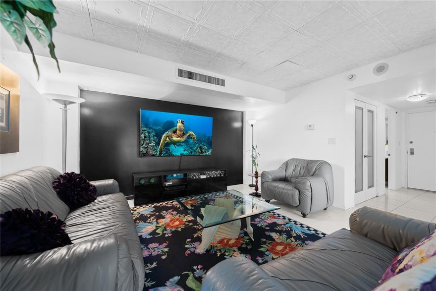 Live the dream in this rare 1st-floor southside unit at Playa Del Mar, offering direct pool and beach access from your private patio—no elevators needed. This 2-bed, 2-bath condo features a split floor plan, tile in living areas, plush carpet in bedrooms, and a MacKenzie-Childs inspired black-and-white motif that's easily customizable. Washer and dryer in the unit. Large storage locker located on same floor. Covered garage parking space. Wake to ocean breezes, sip coffee by the waves, and enjoy resort-style amenities: beachfront pool, sundeck, BBQ, 3 fitness centers, ocean lounge, 24/7 security, and garage parking. Located on Fort Lauderdale's iconic Galt Ocean Mile, this is luxury coastal living at its finest. Walking distance to grocery store, places of worship, doctors and more!