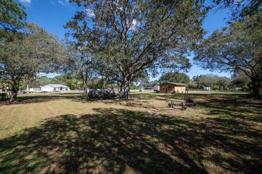 Build Your Dream Home on This Versatile 1.36-Acre Property!
Experience the tranquility of country living just west of town, while still enjoying convenient access to I-95 and being only minutes from beautiful local beaches. This expansive 1.36-acre lot offers endless possibilities including a dwelling on site that can be easily transformed into a charming guest house.

The property is zoned to be subdivided into three separate parcels, providing exceptional investment or development potential. The seller is also open to selling individual lots, offering flexibility for a variety of buyer needs.

Don't miss the chance to own a slice of peaceful Florida living. Schedule your visit today and explore the opportunity to make this exceptional property your own!