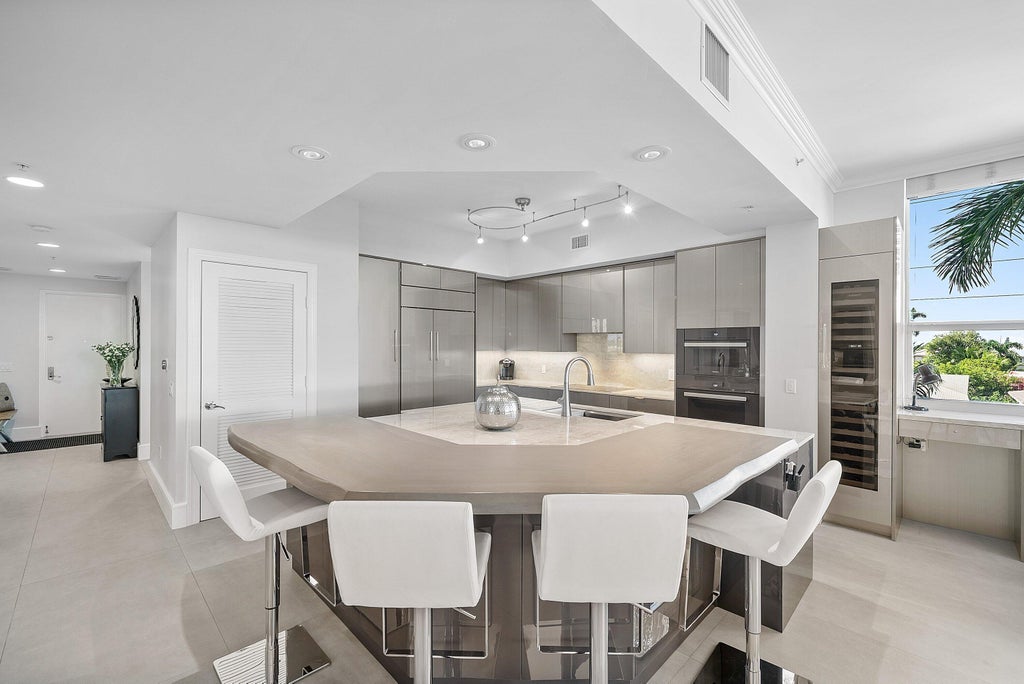 Photo of 701 SE 21st Avenue #301, Deerfield Beach, FL 33441 (MLS # B26081516)