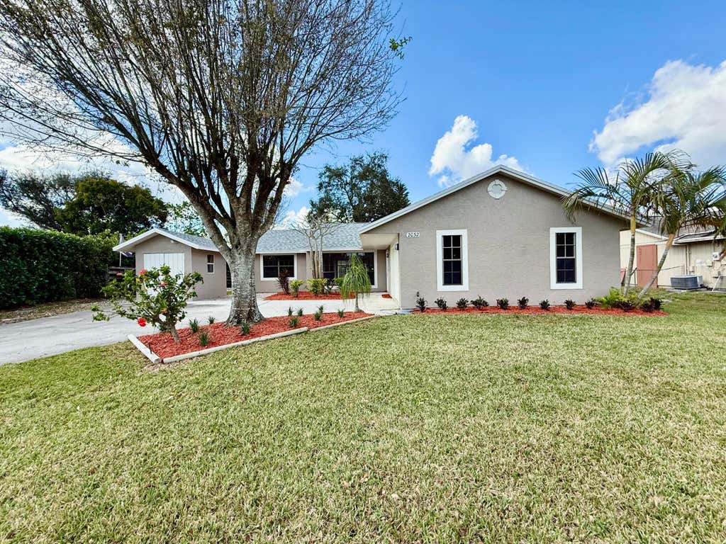 Photo of 2032 SW Greenan Lane, Port Saint Lucie, FL 34953 (MLS # R11060948)