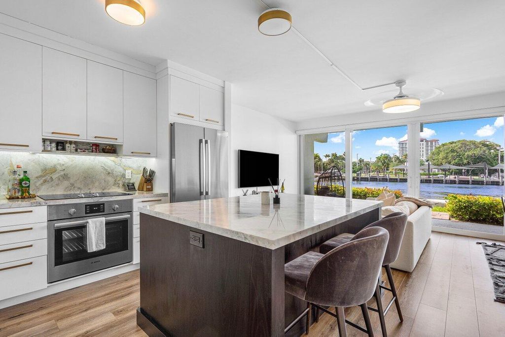 Photo of 65 SE Spanish Trail #1040, Boca Raton, FL 33432 (MLS # R11032758)