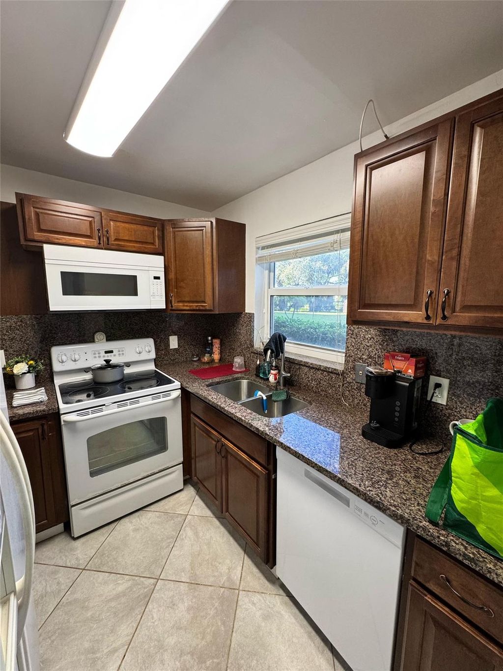 Photo of 941 Crystal Lake Drive #111, Deerfield Beach, FL 33064 (MLS # F10489595)