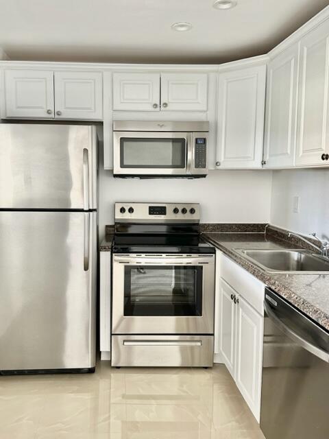 Per Association this is a 55 plus community. 1/1.5, 3rd floor, unfurnished, wood look floor in living area, tile in kitchen, updated kitchen with stainless appliances, no popcorn on ceiling -smooth finish, right next to Brighton pool, close to house of worship,clubhouse and shopping. The amenities include internet and WIFI, Century Village is like living in a resort, fitness center, live shows,movies,buses,classes,bingo,card rooms,trips,tennis,close to shopping and restaurants,come see and then check out the clubhouse to see it for yourself.