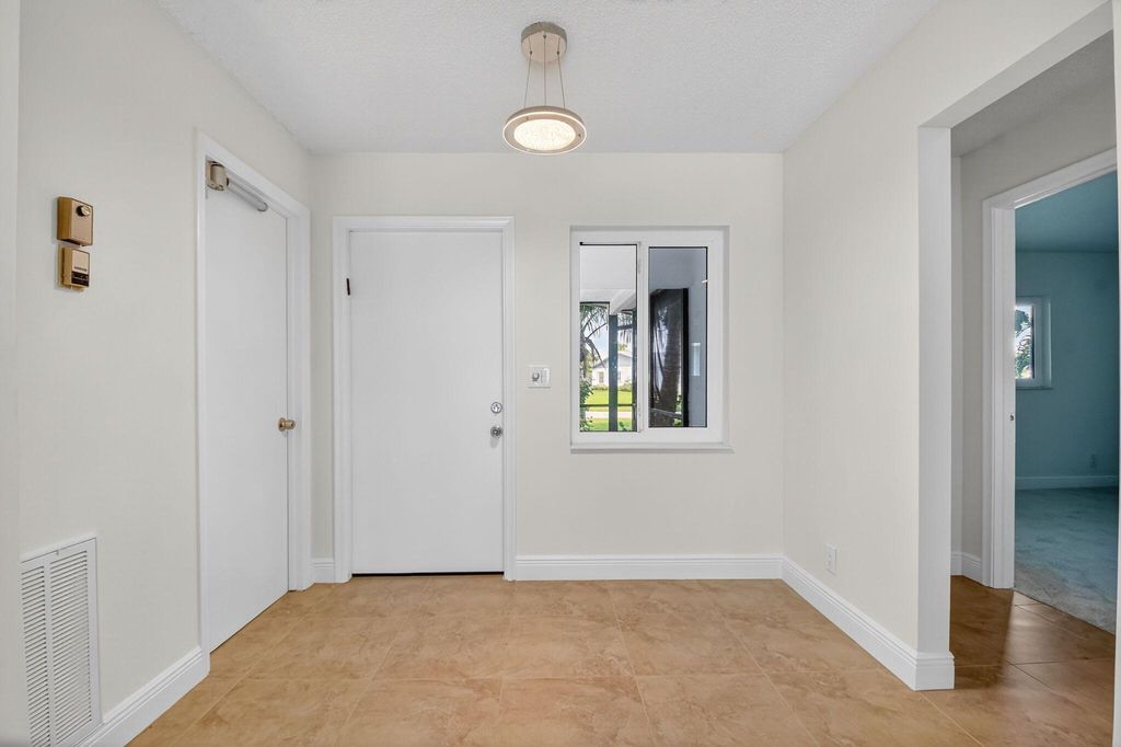 Photo of 6096 Dusenburg Road, Delray Beach, FL 33484 (MLS # R11135542)