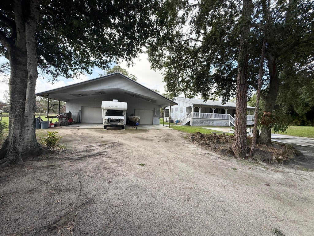 Photo of 14800 99th Street N, West Palm Beach, FL 33412 (MLS # B26052484)