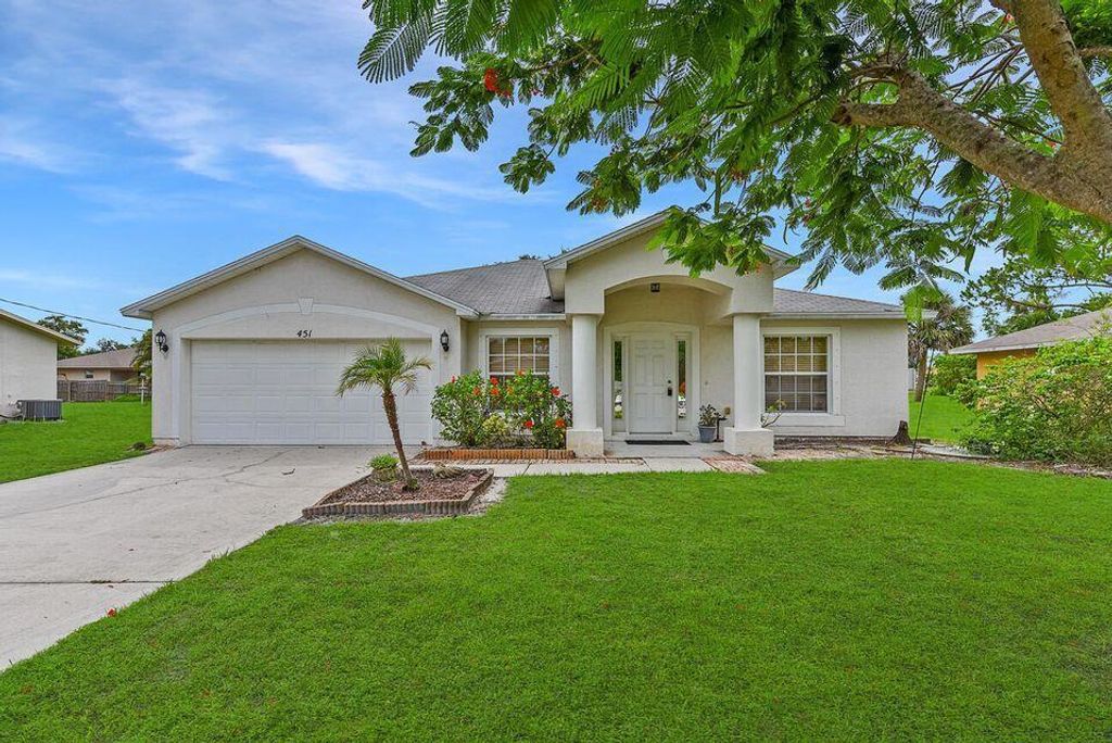 Photo of 451 SW Carmelite Street, Port Saint Lucie, FL 34983 (MLS # R10759411)
